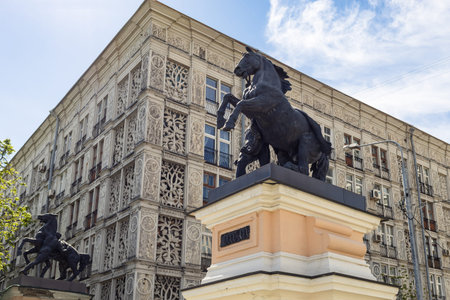 Moscow, Russia - May 23, 2021: The Lacy House (House-accordion) is monument of experimental housing construction in the Art Deco style and pylons of the gates of the Central Moscow Hippodromeのeditorial素材