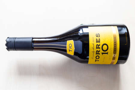 Moscow, Russia - October 16, 2021: lying bottle with TORRES Gran Reserva 10 spanish brandy. Torres 10 Gran Reserva is the most popular Spanish brandy in the world, it has been produced since 1946のeditorial素材