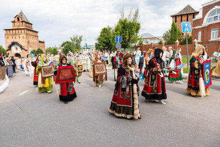 Kolomna, Russia - June 11, 2022: cortege of craftsmen in handmade dress during International...