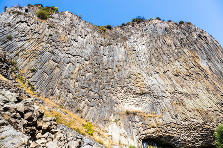 symphony of the stones - natural basalt rocks in Garni gorge in Armenia on sunny autumn day