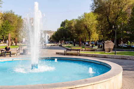 Yerevan, Armenia - September 28, 2023: fountain on Khachkar Square on Pavstos Buzand street in central Kentron district of Yerevan city on sunny autumn eveningのeditorial素材