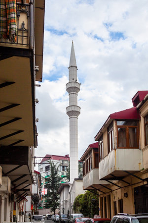 Batumi, Georgia - September 16, 2023: view of Orta Jame mosque minaret from Khulo street in old town of Batumi on autumn day. Batumi Central Mosque was built in 1886のeditorial素材