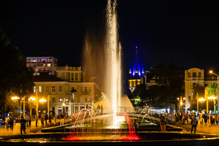 Batumi, Georgia - September 16, 2023: dancing fountains on seaside boulevard in Batumi city on autumn nightのeditorial素材