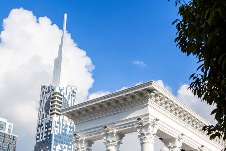 Batumi, Georgia - September 17, 2023: Italian colonnade on Batumi boulevard and skyscraper tower on sunny autumn day. The colonnades were built in 1934 on the very shore of the Black Seaのeditorial素材