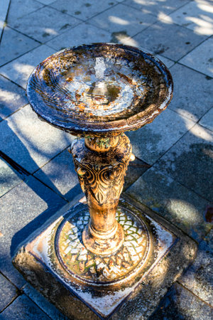 travel to Georgia - water bubbler with drinking water on street of Batumi city in autumn morningの写真素材