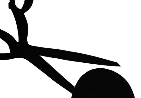 top view of silhouette of large tailor's scissors and spool of thread drawn by hand with black ink...