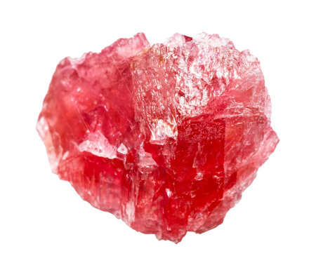 close up of sample of natural stone from geological collection - raw rhodonite crystal isolated on...