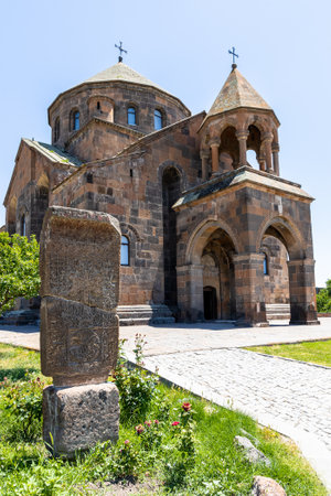 view of ancient khachkar cross-stone and St Hripsime Church in Etchmiadzin, Armenia on sunny summer dayâ¤ St Hripsime Church was listed in UNESCO World Heritage Sitesの写真素材