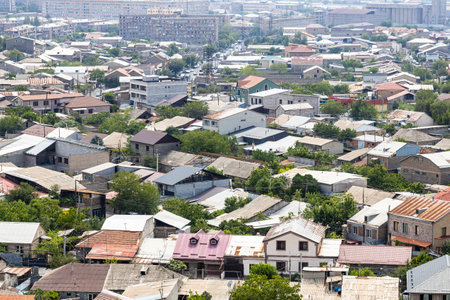 aerial view of urban houses in Yerevan city from Erebuni Fortress on sunny summer dayの写真素材