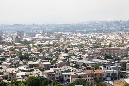 aerial view of residential disticts in Yerevan city from Erebuni Fortress on sunny summer dayの写真素材