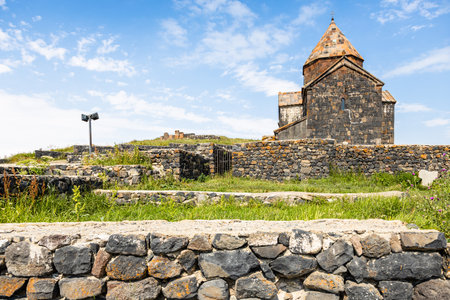 view of Surp Arakelots church in Sevanavank Sevan Monastery, Armenia on sunny summer day on Sevan Peninsulaの写真素材