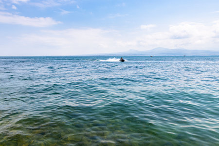 water surface of Lake Sevan, Armenia on sunny summer dayの写真素材