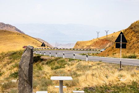 turn of mountain road between Ararat and Vayots Dzor Provinces, Armenia on summer dayの写真素材