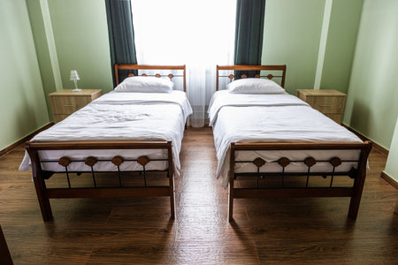 two beds in room in local Armenian hotelの写真素材