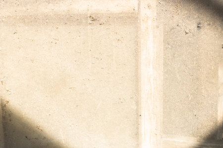 sunlit window glass surface covered with dirt and dust