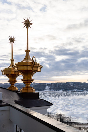 outdoor decor of Epiphany Cathedral and view of river in Kostroma city on cloudy winter evening