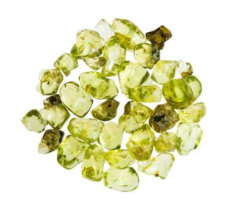 close up of sample of natural stone from geological collection - many polished peridot minerals...