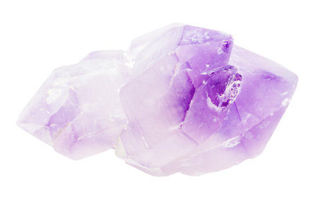 close up of sample of natural stone from geological collection - rough amethyst crystals mineral isolated on white backgroundの写真素材
