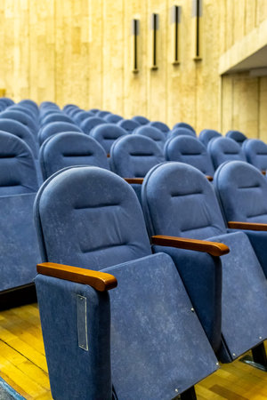blue soft seats in auditorium of theater close up