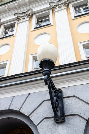 lamp on facade of house of All-Russian Decorative Art Museum in previous city estate of Count Osterman on Delegatskaya street in Moscow city on spring dayの写真素材