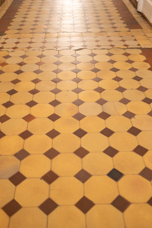 brown tiled flooring in entrance hall of city houseの写真素材