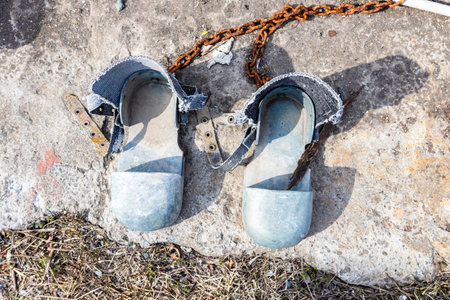 lead diving boots in urban port in Petropavlovsk-Kamchatsky city on spring day, Kamchatka Krai, Russiaの写真素材