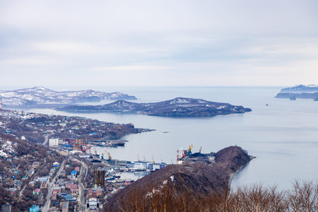 above view of pacific ocean and port in Petropavlovsk-Kamchatsky city from Mishennaya sopka on...