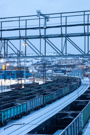 travel to Murmansk Oblast of Russia in winter season - view of railroad in blue winter dusk