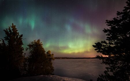 Aurora borealis over lake saimaaの写真素材