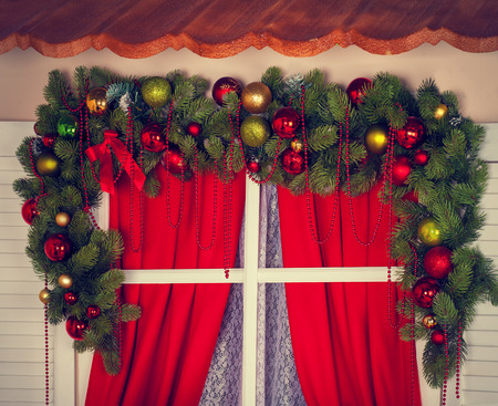 Window with Christmas-tree decorationsの写真素材