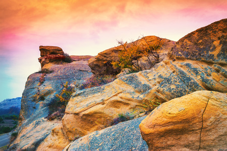 Stony mountain in antique cave city Uplistsikhe, Georgia countryの写真素材