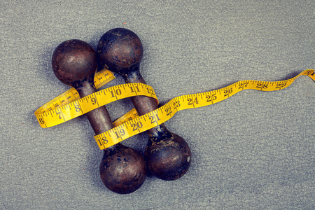Retro iron grunge dumbbellsの写真素材
