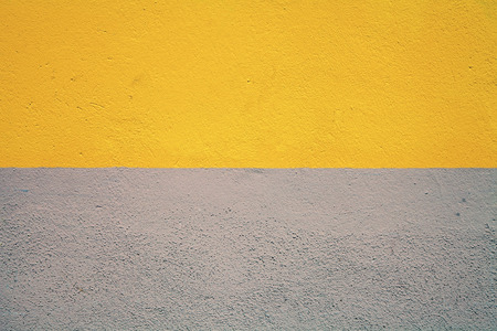 Grunge background, half painted concrete wallの写真素材