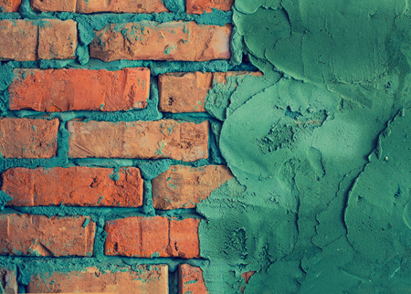 Brick wall with concrete abstract grunge backgroundの写真素材