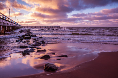 Pier and sea at sunsetの写真素材