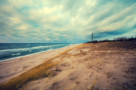 Sea shore with cloudy skyの写真素材