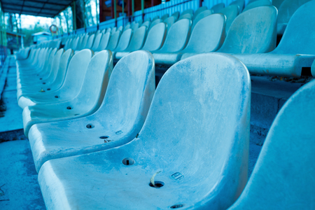 rows of blue chairsの写真素材