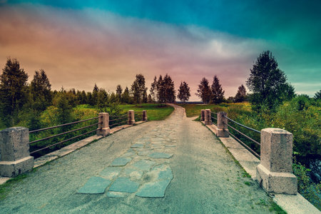 Bridge over river at sunset lightの写真素材