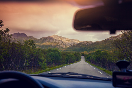 Driving a car on mountain roadの写真素材