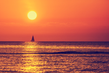 Evening on the beach. Magical sunset over seaの写真素材