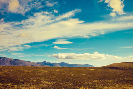 Mountain landscape with blue cloudy sky. Beautiful nature norwegian lapland. Polar circle, Nordkapp