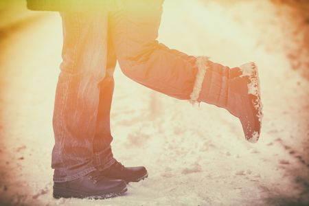 The couple in love outdoors in winter. Retro filter, vintage colorの写真素材