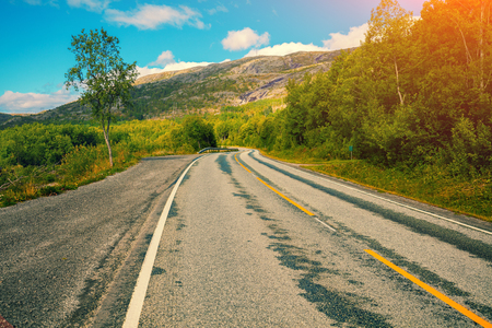 Driving a car on a mountain road. Nature Norwayの写真素材