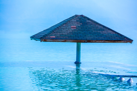 Sun umbrella in the water. Beautiful blue seaの写真素材