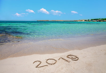 Inscription 2019 on the beach