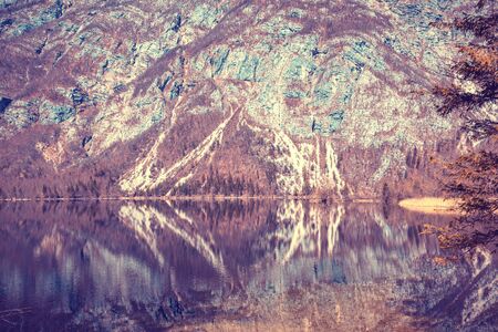 Mountain lake with reflection in the waterの写真素材