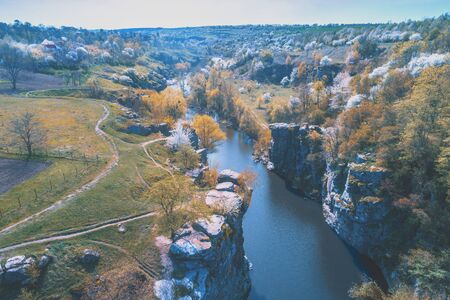 Beautiful landscape with a mountain river. The canyon in early spring. View from aboveの写真素材