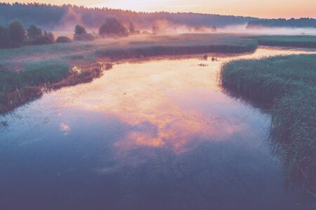 The magical sunrise over the lake. Rural landscapeの写真素材