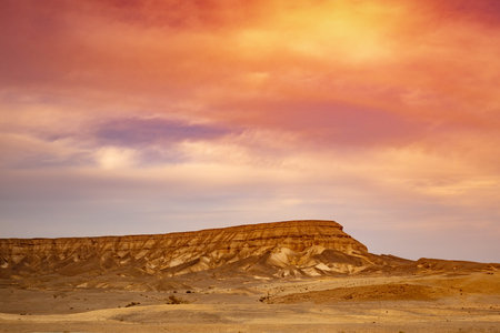 Mountain nature landscape. Desert in the evening. Orange sunset in mountains. The Judaean Desert....