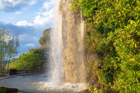 Waterfall cascade in the park. Nature landscape in springの写真素材